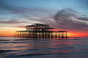 Brighton & Hove Mouse Mat Collection: Starling Murmuration at Brightons West Pier in England