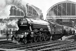 Steam Trains Fine Art Print Collection: The Flying Scotsman pulls out of Londons Kings Cross station to make the last