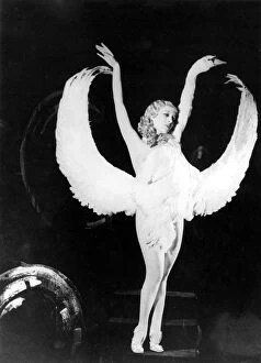The Party Season Metal Print Collection: Sally Rand of Fan Dance fame is shown in one of the positions in her new dance which
