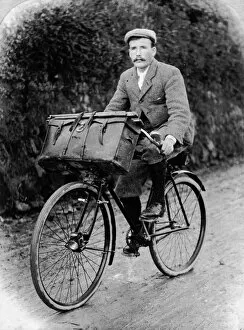 St John Collection: Samuel John Govier on his bicycle with his photographic box on the front, Cornwall. Early 1900s