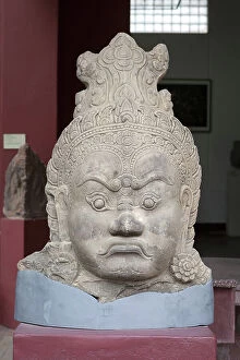 Phnom Penh Mouse Mat Collection: Head of guardian, from the gate of Angkor Thom, Siem Reap, angkorian period, Bayon style