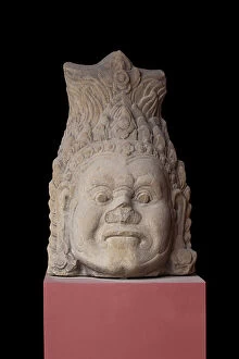 Phnom Penh Mouse Mat Collection: Head of Yaksa, from the gate of Angkor Thom, angkorian period, Bayon style, late 12th century