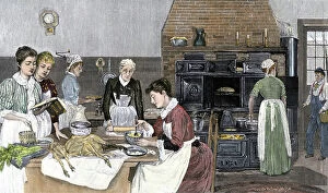 Thanksgiving Pillow Collection: Women preparing Thanksgiving dinner in a gigantic kitchen, USA, circa 1890