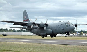 Us Air Force Collection: A C-130 Hercules lands at McChord Air Force Base, Washington