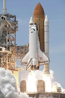Space Travel Collection: Space shuttle Atlantis twin solid rocket boosters ignite to propel the spacecraft