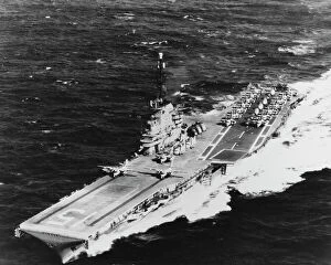 1962 Collection: USS Randolph underway at sea with two S2F airplanes on its catapults, 1962