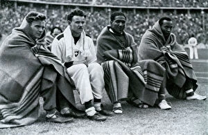 Athletics Canvas Print Collection: Athletes Frank Wykoff, Paul Hanni, Ralph Metcalfe and Jesse Owens, Berlin Olympics, 1936