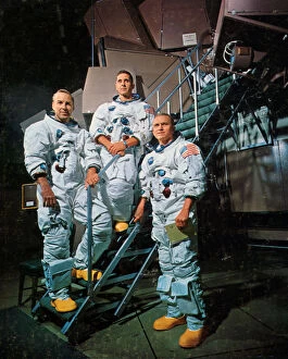 Apollo 8 Collection: The crew of Apollo 8 in front of a simulator, 1968. Artist: NASA