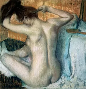 Impressionist paintings Collection: Woman Combing Her Hair, 1886. Artist: Edgar Degas