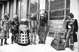 Dr Who Cushion Collection: Actor Tom Baker as Dr Who, with his robot dog K-9, and assorted friends at the US Embassy 1978