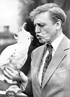 Eighties Collection: Sir David Attenborough with a cockatoo