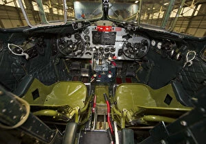 RAF Collection: Cockpit shot of the BBMFs Douglas Dakota ZA947 in the hanger at RAF Coningsby