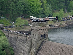 Royal Air Force Framed Print Collection: Dambuster Lancaster Soars Again Over the Derwent Valley Dam