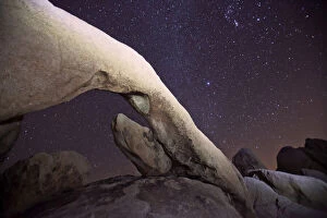Update - March 23, 2022 Collection: Arch Rock under a starry night sky, Joshua Tree National Park, California, USA