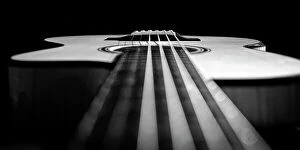 Art Images - December 11, 2023 Photographic Print Collection: B&W close up of the neck, strings and top of a steel string acoustic guitar built by luthier John