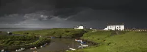 Seaton Jigsaw Puzzle Collection: Dark Storm Clouds Over A Village On The Coast; Seaton Sluice Northumberland England