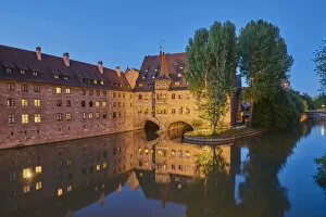 Travel and Culture Photographic Print Collection: Heilig-Geist-Spital (Holy Spirit Hospital) along the Pegnitz River, Nuremberg, Franconia, Germany