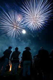 Looking Up Collection: UK, England, East Sussex, People watching fireworks at Nevill Junior Bonfire night; Lewes
