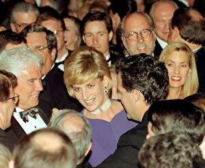Tours Collection: Diana, Princess of Wales, surrounded by people as she dances with Grant McCullagh at a