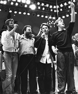 Live Aid Concert, Wembley 1985 Metal Print Collection: George Michael, Harvey Goldsmith, Bono and Paul McCartney seen here performing Feed