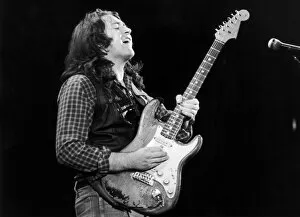 Fender Collection: Irish blues rock musician and singer Rory Gallagher piuctured performing in concert