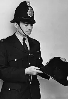 01502 Collection: PC John Soanes wearing the new helmets which have been issued to officers in Essex