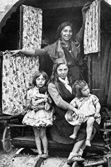 Caravan Collection: A typical gypsy family at the door of their caravan at the 700 year old fair at Yarm