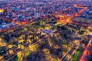 Romania Fine Art Print Collection: Galati, Romania - February 28, 2021: Aerial view of Galati City, Romania, at sunset with city lights