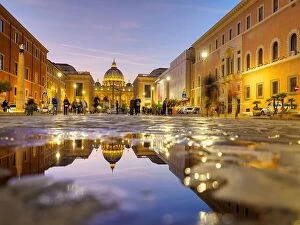 Destinations Collection: Wonderful view of St Peter Cathedral, Vatican, Rome, Italy. Sunset sky with night city lights